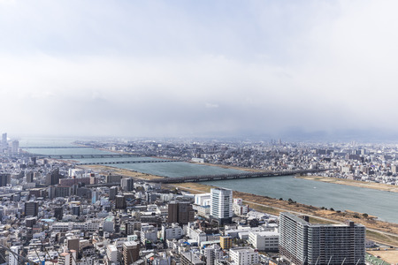 OSAKA, JAPAN - 09 FEBRUARY 2015 - The city of Osaka, in the Kansai region and Osaka prefecture, is the second largest metropolitan area in Japan. Downtown Osaka is very modern with many skyscrapers.のeditorial素材