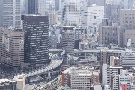 OSAKA, JAPAN - 09 FEBRUARY 2015 - The city of Osaka, in the Kansai region and Osaka prefecture, is the second largest metropolitan area in Japan. Downtown Osaka is very modern with many skyscrapers.のeditorial素材