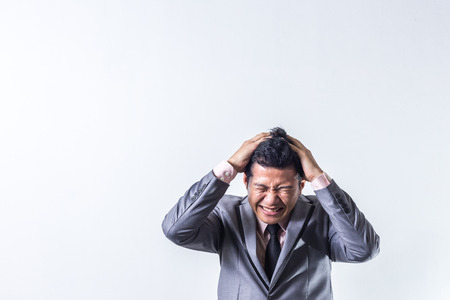 Asian business man serious with job.の写真素材