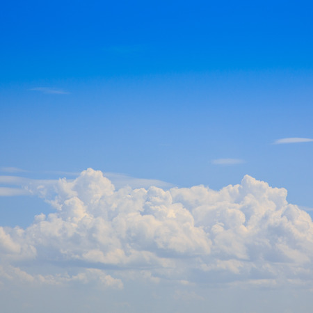 Blue sky with clouds backgroundの写真素材