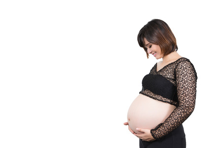 Pregnant woman Looking belly 9 months, the prenatal isolate white background.の写真素材