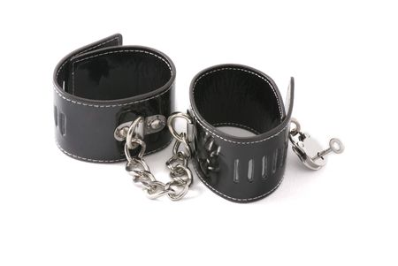 Black leather hancuffs isolated on white background