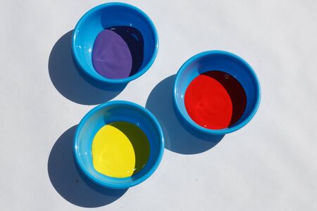 Coloured paints prepared for pinter with white backgroundの写真素材
