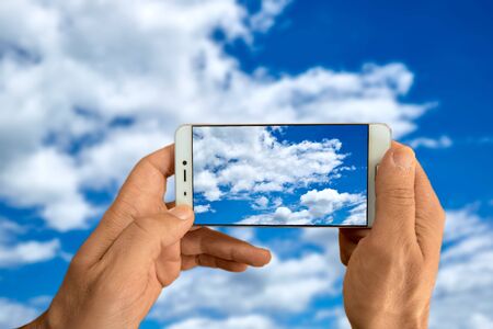Blue sky with white clouds for the backgroundの写真素材