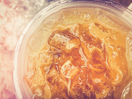 Iced tea in plastic glass, close upの写真素材