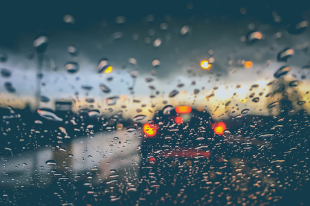 Abstract blurred background of traffic jam on heavy rainの写真素材