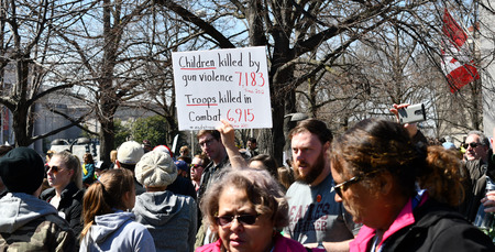 WASHINGTON, DC, USA - MARCH 24, 2018: People demonstrate in the March For Our Lives, a student-led...