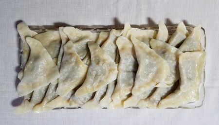 Platter of gnocchi, dumplings stuffed with plum marmalade, a traditional Ukrainian Christmas meal.