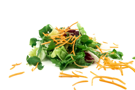 fresh vegetable salad isolated on white backgroundの写真素材