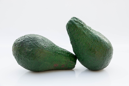 Beautiful Avocado isolated on a white backgroundの写真素材