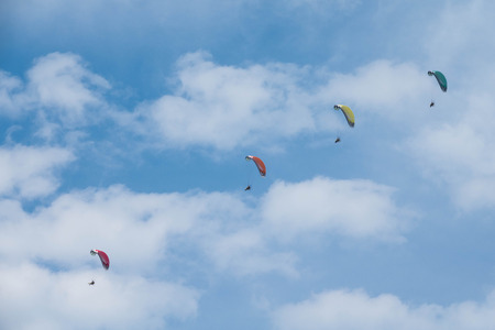 The beautiful motorized hang glider in the blue sky colorの写真素材