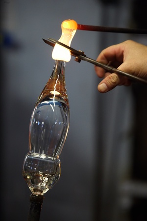 Production of a wine glass in a glass factory. Norway 