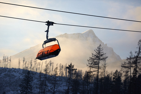 Cabin mountain lift  on the mountain backgroundの写真素材