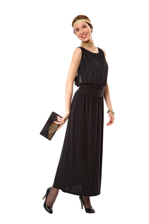 Girl in a black retro dress  isolated on white, 1930s Styleの写真素材