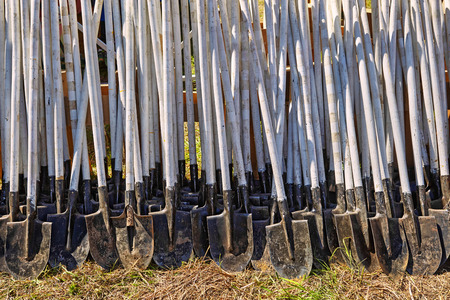 Row ground grass shovelsの写真素材