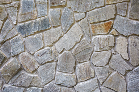 Decorative masonry. Stone wall brick texture backgroundの写真素材