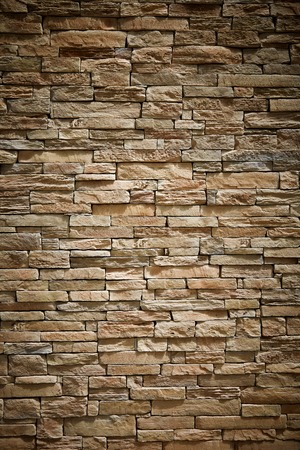 stone wall brick texture background beige surface facadeの写真素材