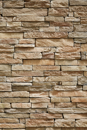 stone wall brick texture background beige surface facadeの写真素材