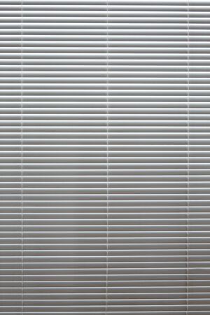 Horizontal background blinds white aluminum back light gradientの写真素材