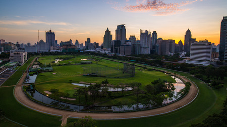 Sunrise at central of Bangkok with surround buildingの写真素材
