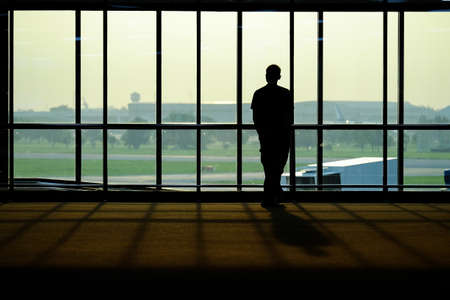 Silhouette of people in the airport