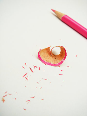 White drawing paper before drawing, pink colored pencils and shavingsの写真素材