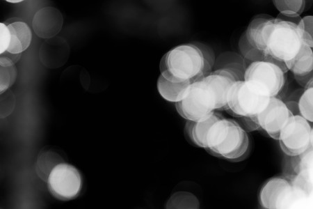 Background black abstract bokeh for christmas night light holidayの写真素材