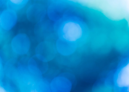 blue natural background of out of focus forest or bokehの写真素材