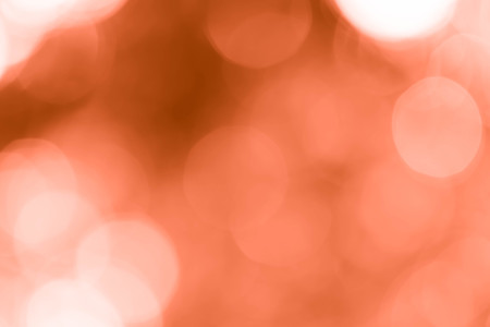 Blur orange leaves with bokeh, abstract backgroundの写真素材