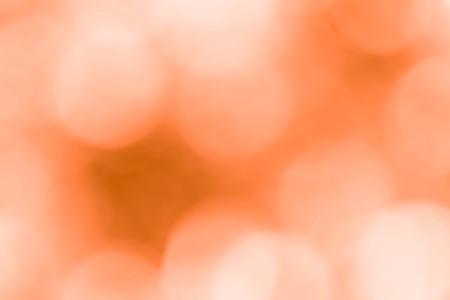 orange bokeh background from nature under tree shadeの写真素材