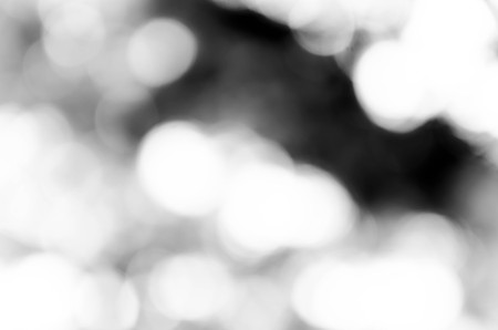 Black bokeh texture on black backgroundの写真素材