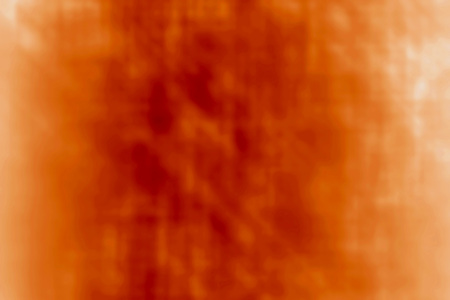 Bright orange background with reflectionの写真素材