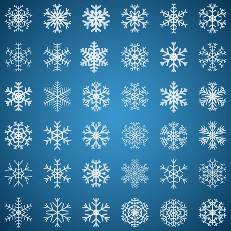 Set of white snowflakes various forms on blue backgroundのイラスト素材