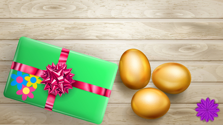 Realistic golden Easter eggs and beautiful gift box with bow on wooden planksのイラスト素材