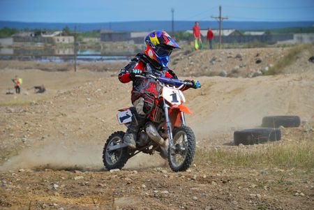 MONCHEGORSK, RUSSIA, JUNE 14: Motorcross racers get ready to start the 2nd stage of the championship...