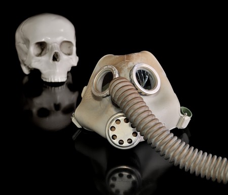 Gas mask and skull on a Black background.の写真素材