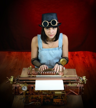 Girl and Steampunk style future Typewriter. の写真素材