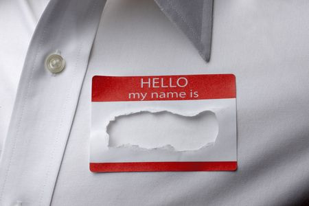 Close up of name tag on shirt with name torn outの写真素材