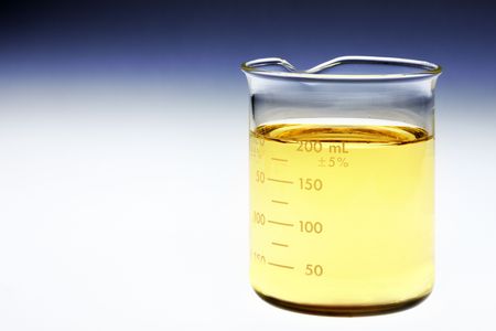 Glass beaker of bio fuel shot on light box with room for copyの写真素材