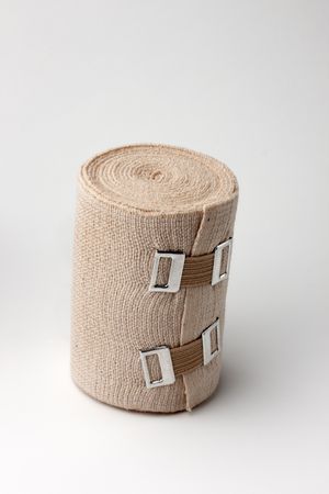 close up of roll of ace bandage with clipsの写真素材