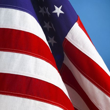 Cose-up shot of American flag waving in breeze