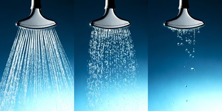 3 shots of chrome sprinkler with water coming out at different degrees of pressureの写真素材