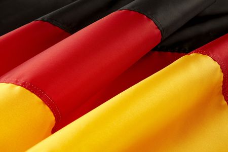 Extreme close up shot of colorful, wavy German flagの写真素材