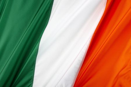 Close up shot of wavy, colorful Irish flagの写真素材