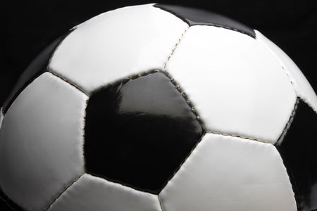 Close up shot of black and white soccer ballの写真素材