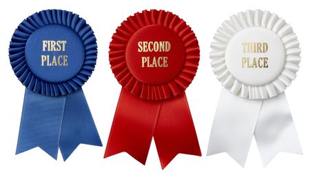 Close up shots of first, second and third place ribbons shot on white backgroundの写真素材