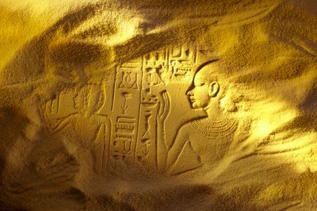 Ancient Egyptian hieroglyphs uncovered in the sandy desertの写真素材