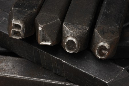 The word Blog spelled with grungy, metal lettersの写真素材