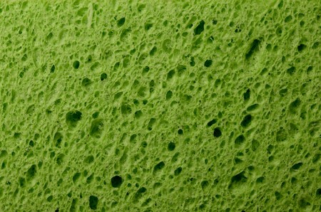 Macro shot of dry, textured, green spongeの写真素材