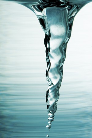 close up shot of chemicals swirling in a beakerの写真素材